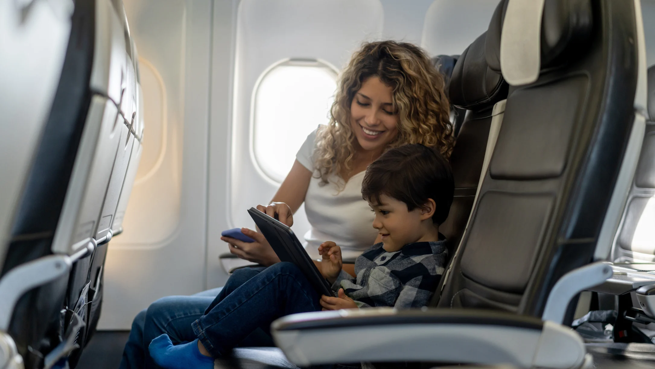 mother and child on a plane