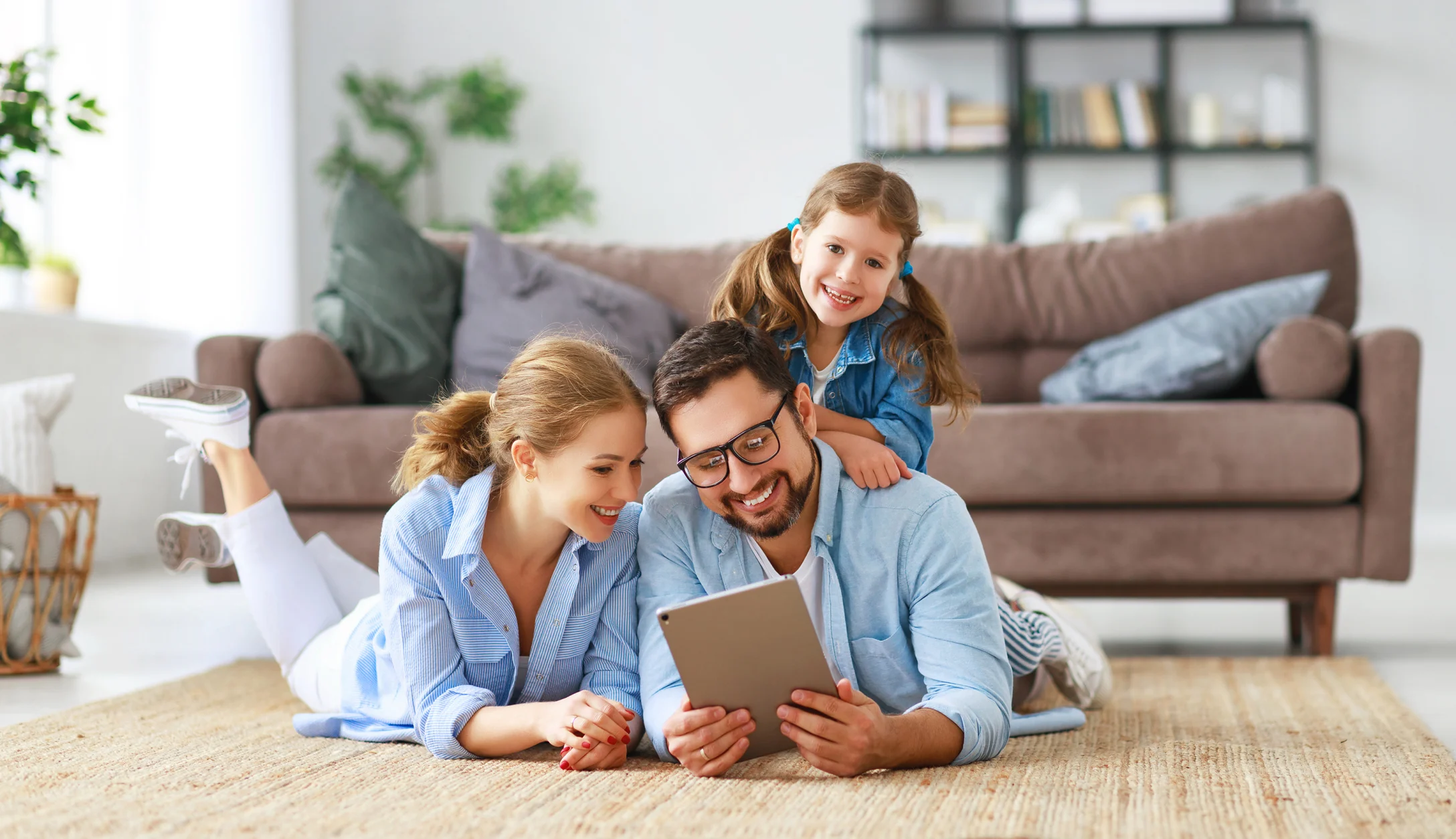 family looks at tablet